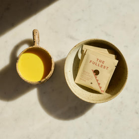 Cardamom and saffron notes mingle with coconut milk for rich aroma.