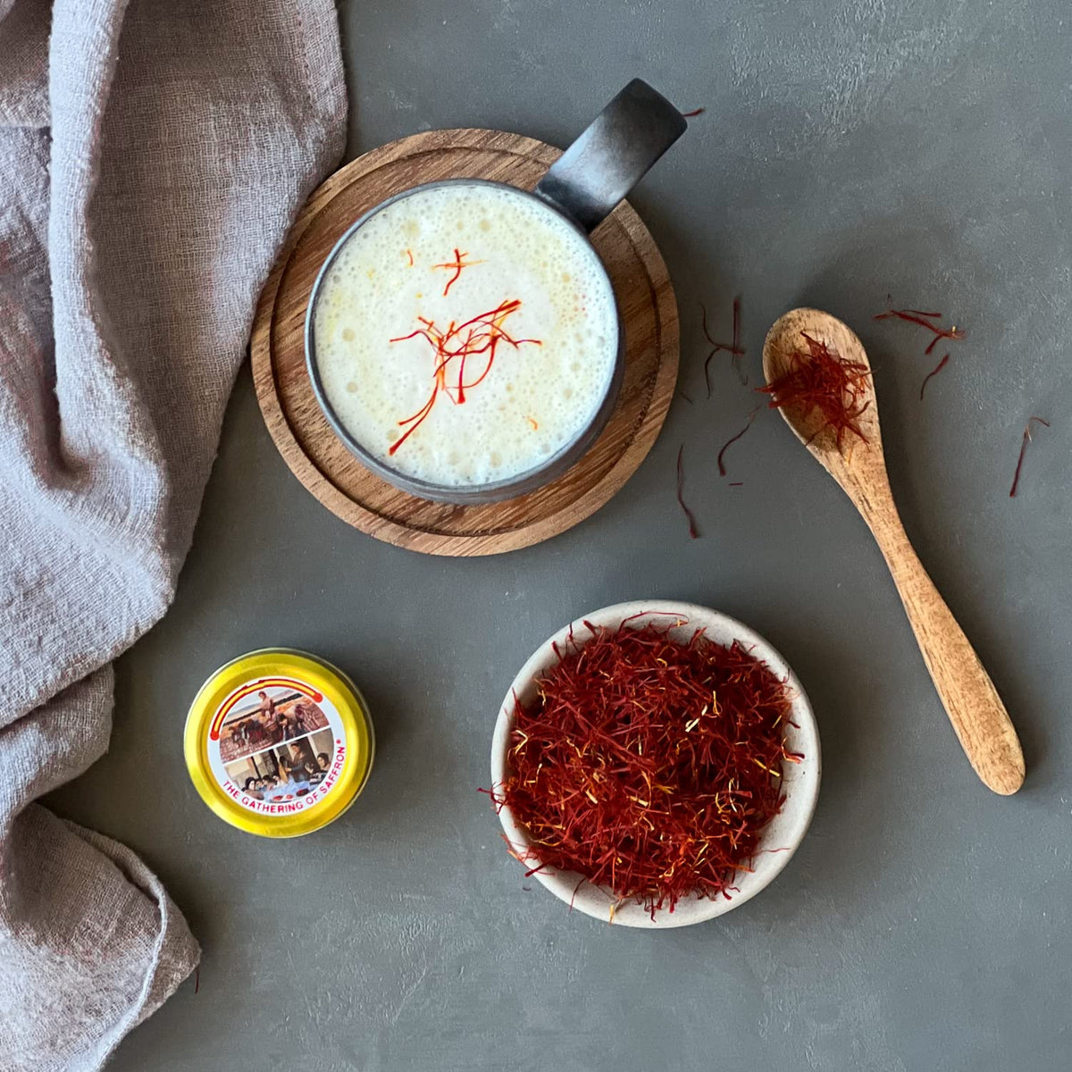 The Gathering of Saffron aroma rising from threads during cooking paella.