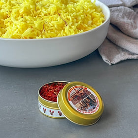 The Gathering of Saffron packaging on kitchen counter highlights 140-year heritage.