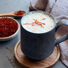 The Gathering of Saffron paella dish shot captures vibrant saffron color.