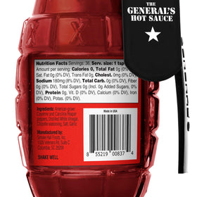 Pour shot of The General's Reaper Actual highlighting glossy, fiery consistency for wings and tacos.