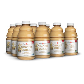 The Ginger People 99% pure ginger juice bottle pouring for daily shots.