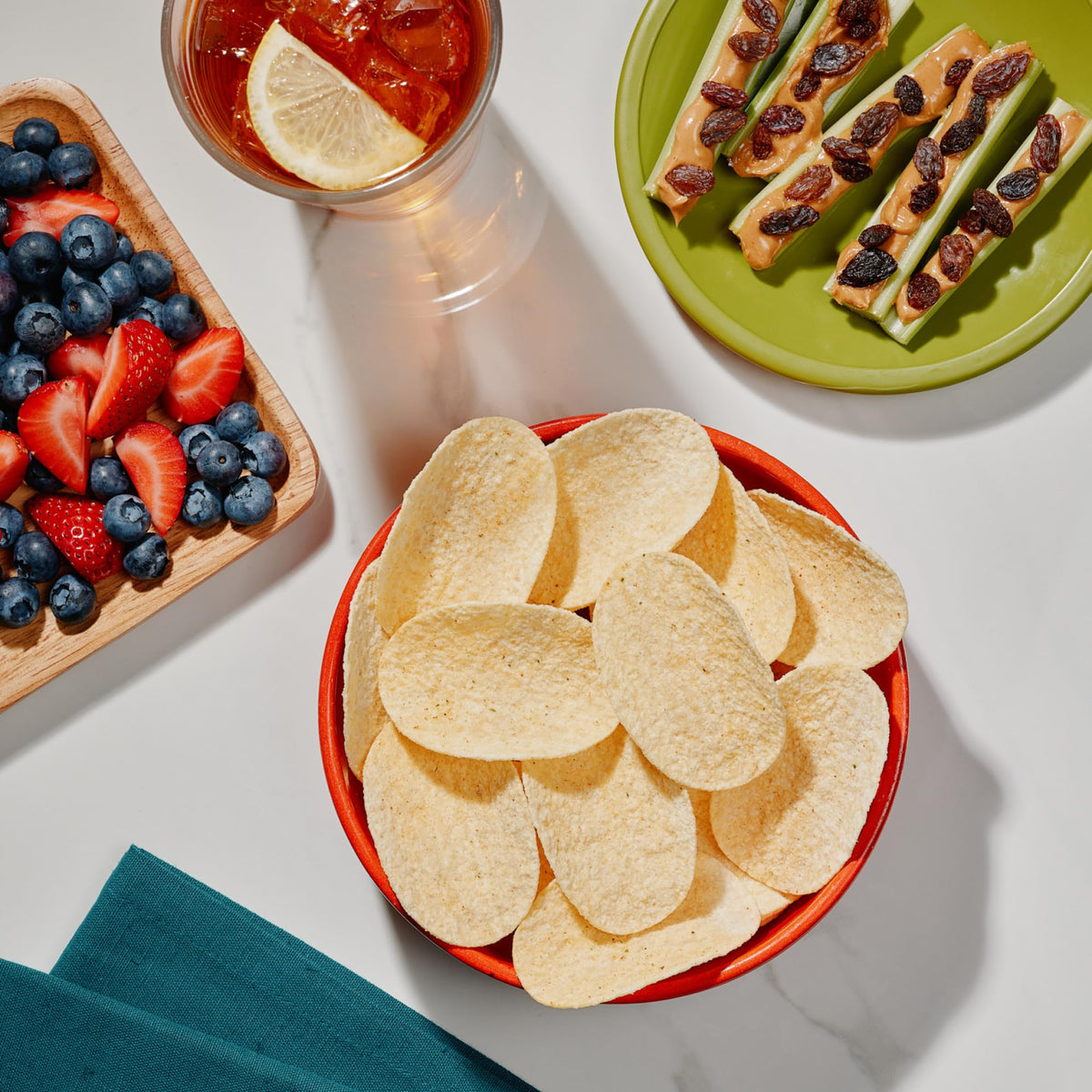 Serving suggestion in a lunchbox featuring Sour Cream and Onion minis