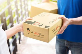 The Good Grocer premium gift box packaging for vegan snacks.