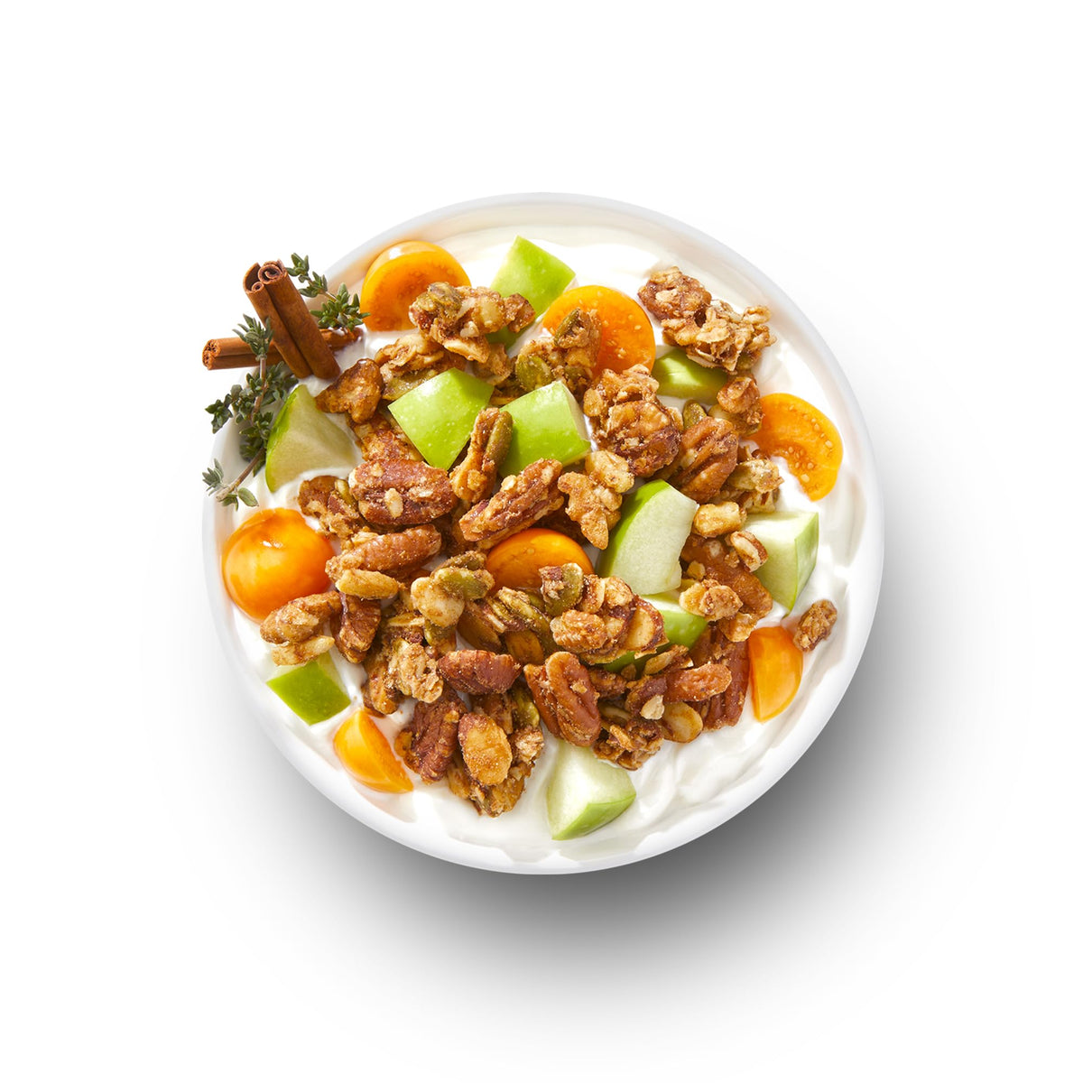 Serving bowl with THE GRANOLA BAKERY Cinnamon Keto Granola atop berries