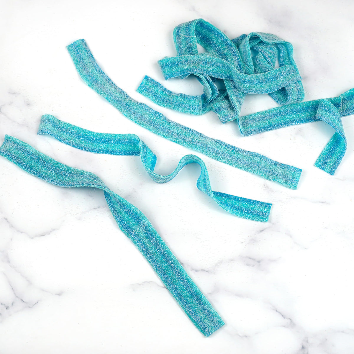 Bulk bag packaging of The Hampton Blueberry Sour Belts for events.