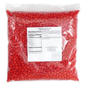 The Hampton Candy Company Cinnamon Imperials closeup of red hot candies ready for snacking.