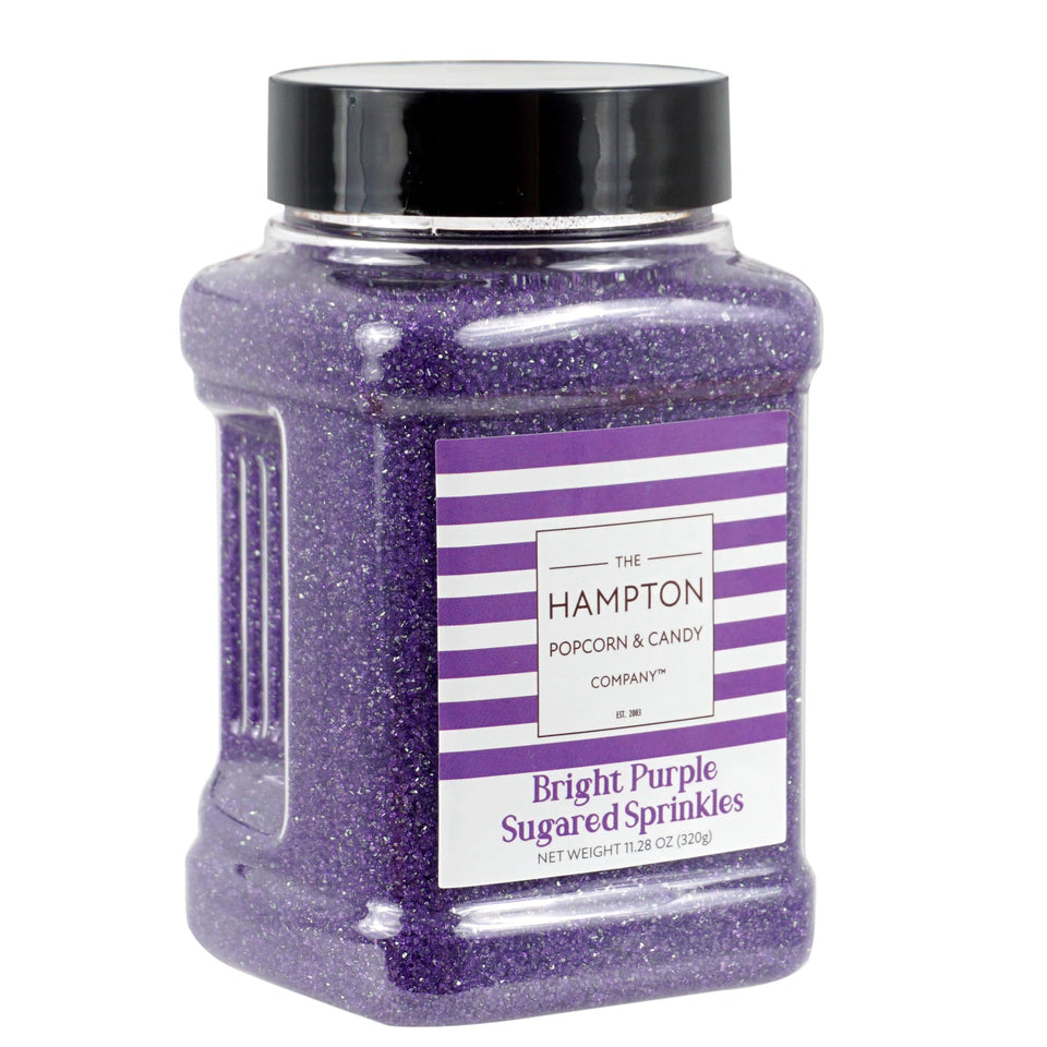 The Hampton Candy Company bright purple sanding sugar jar for vibrant dessert decorating.