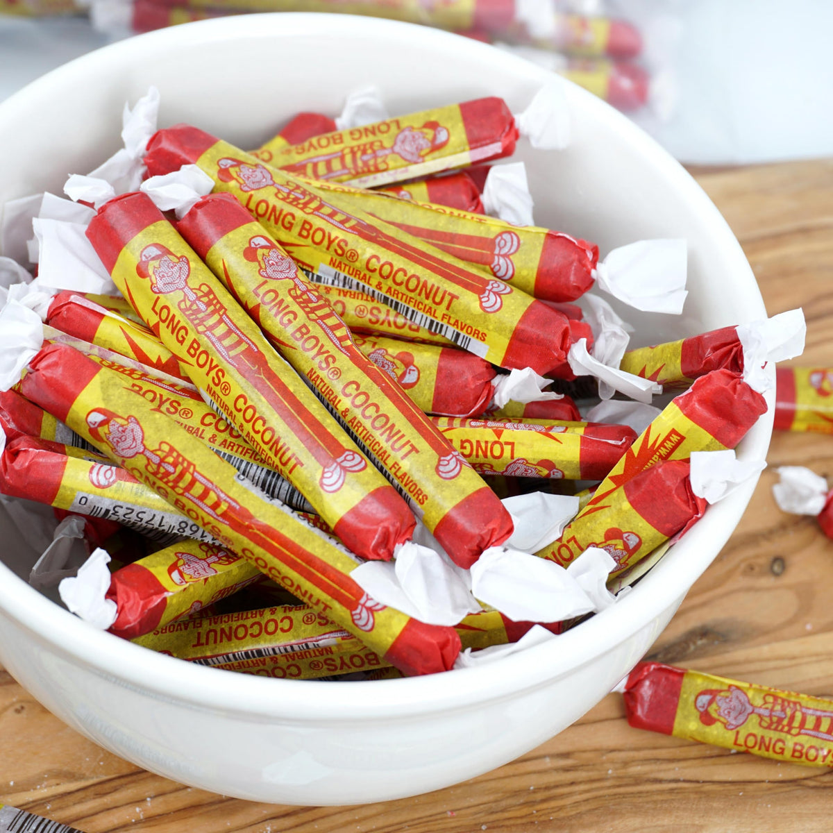 The Hampton Candy Company party-ready coconut long boys on a snack table.