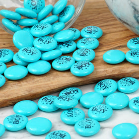 The Hampton Candy Company pour shot of blue gum buttons for candy bar setup