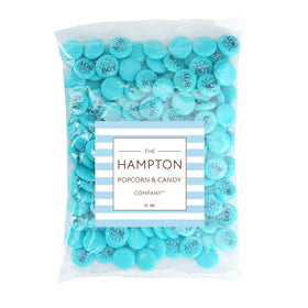 The Hampton Candy Company blue baby boy buttons on display for shower treats