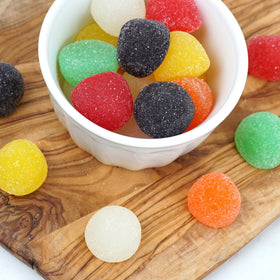 Gum drops arranged in a party bowl by The Hampton Candy Company for easy sharing.