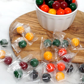 Party table display featuring jawbreakers as a bright candy centerpiece.