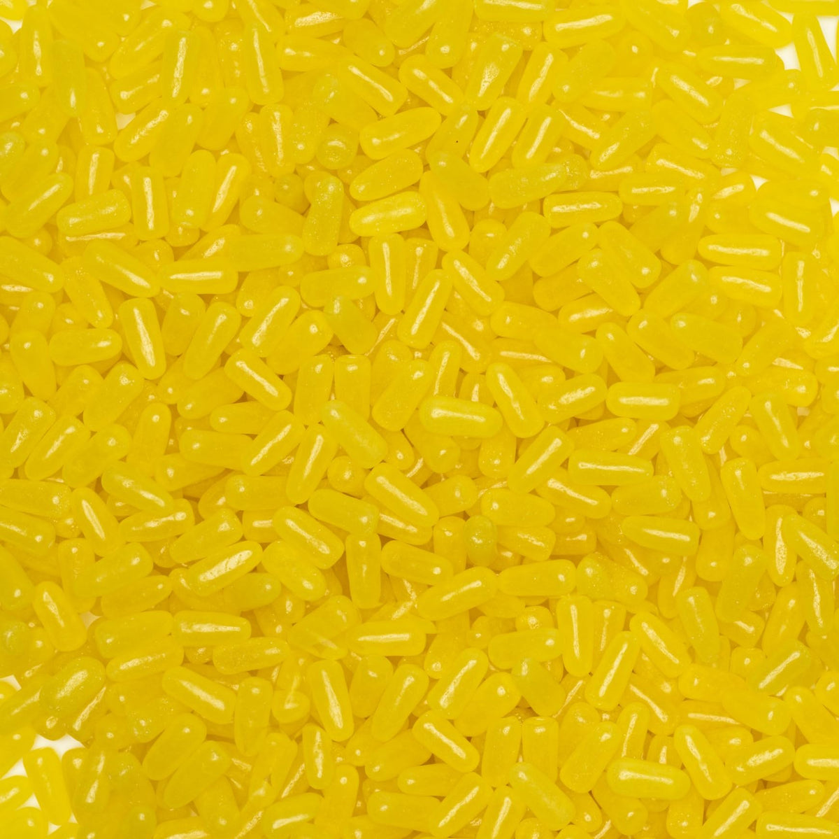 Mike and Ike Sour Lemon single-serve pack closeup, perfect for lunchboxes and on-the-go snacking.