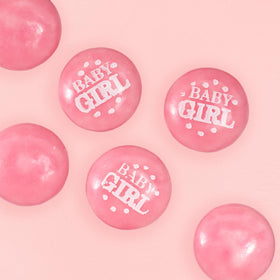 Close-up of pink gum candies highlighting bright hue and playful texture.