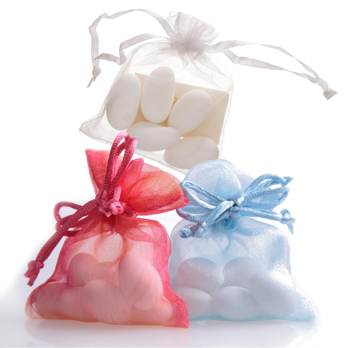 White Jordan Almonds make refined wedding favors with timeless charm from The Hampton Candy Company.