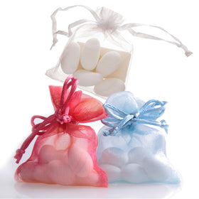 White Jordan Almonds make refined wedding favors with timeless charm from The Hampton Candy Company.
