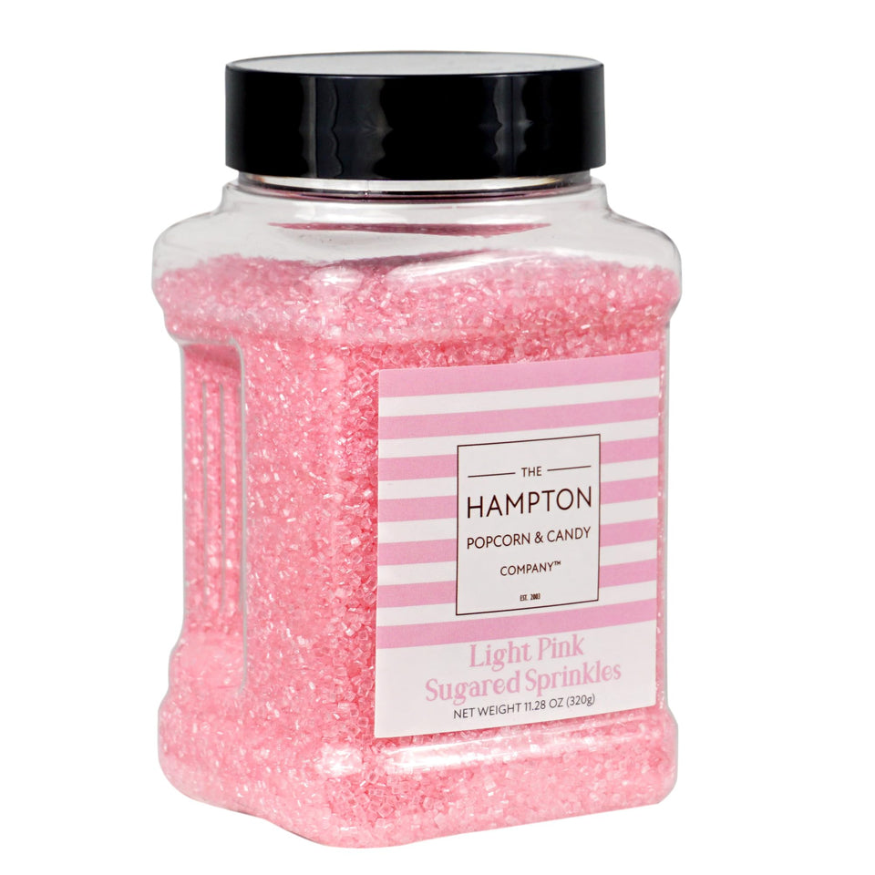 The Hampton Candy Company pink sanding sugar jar adds festive color to treats