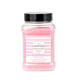 The Hampton Candy pink sanding sugar pour enhances baked goods with subtle crunch and sheen