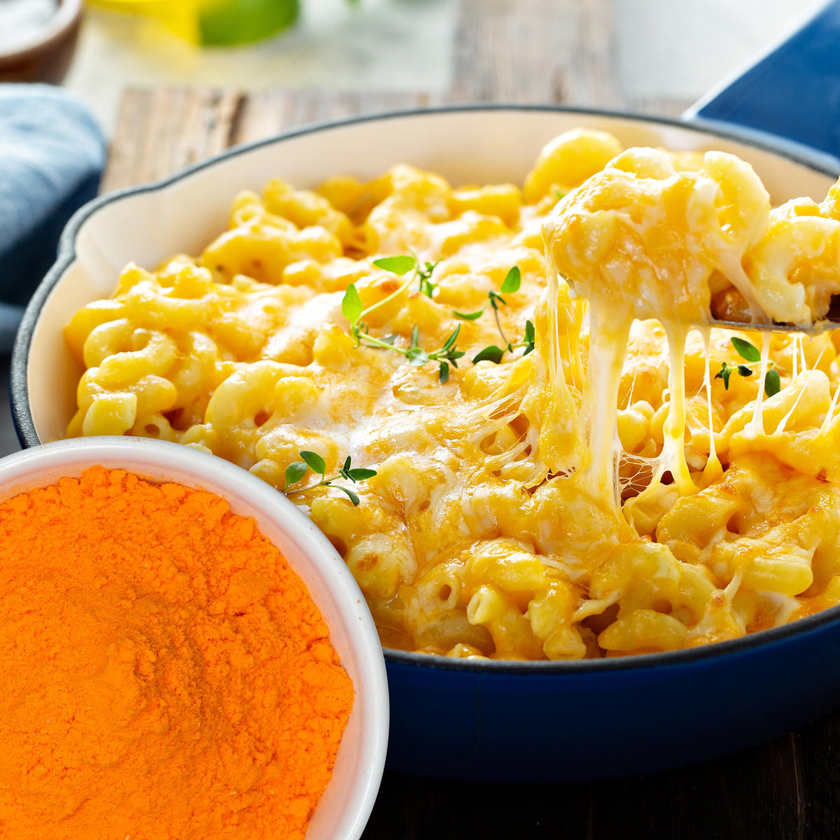 The Hampton Popcorn Company cheddar cheese powder dusted on popcorn for bold flavor.