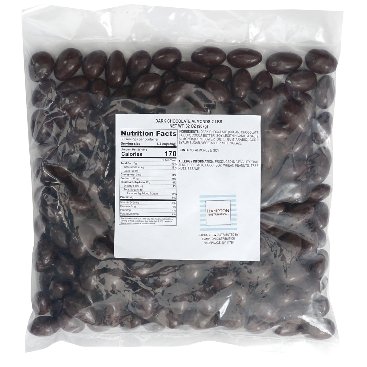 The Hampton dark chocolate almonds closeup: glossy coating with crunchy almonds