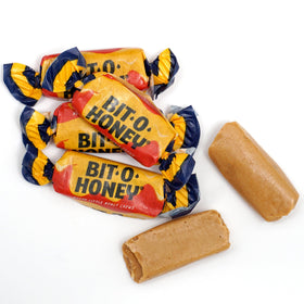 Close-up of Bit-O-Honey candy showing chewy honey taffy texture.