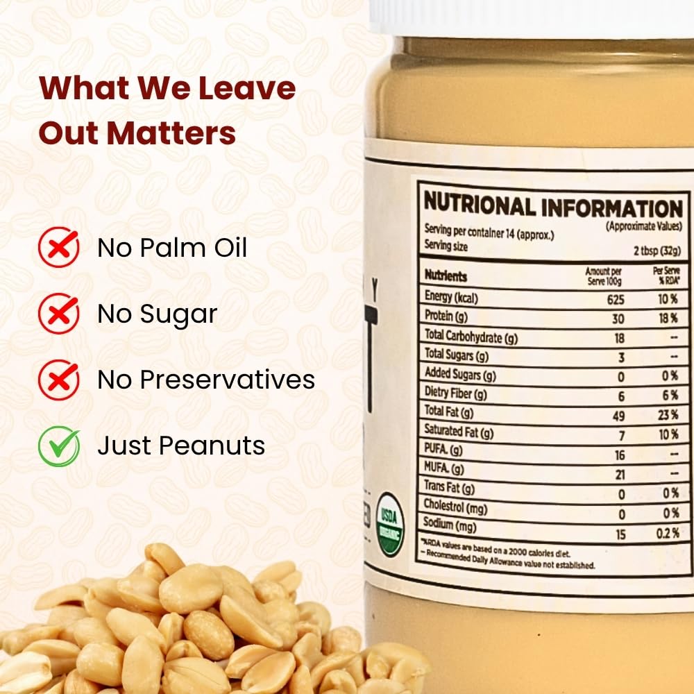 The Holly Tree Peanut Butter on a spoon with unsweetened, additive-free spread.