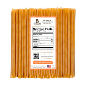 The Honey Jar peach honey stick sweetens coffee with peach zest.