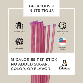 Raspberry honey stick in a cup highlighting simple sweetening for beverages.