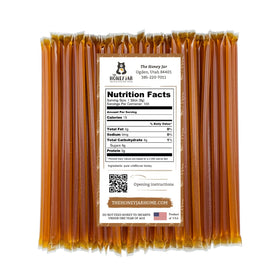 The Honey Jar Wildflower Honey Sticks used as a coffee sweetener.