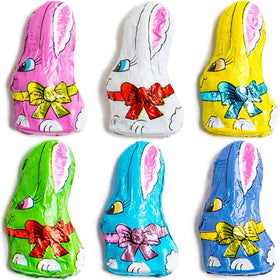 The Madeleine bunny wrapped with ribbon, ideal for Easter table decor.