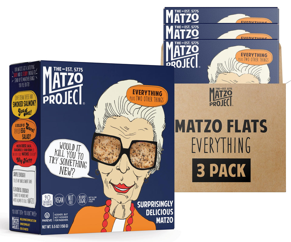 The Matzo Project Crispy Matzo Flats on a cheese board, ideal for dips.