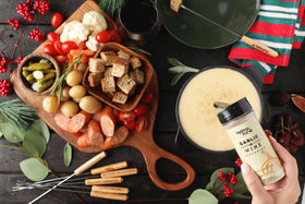The Melting Pot garlic and wine seasoning on seafood to boost flavor.