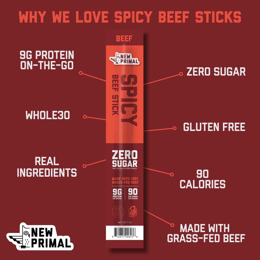 The New Primal grass-fed spicy beef sticks in hand for on-the-go protein.