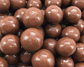 The Nutty Fruit House milk chocolate malt balls, individually wrapped for freshness.