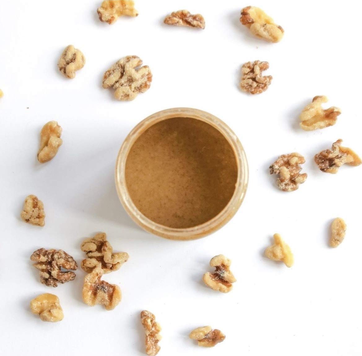 The Nutty Gourmet California-grown walnuts, fresh and high-quality ingredient depiction.