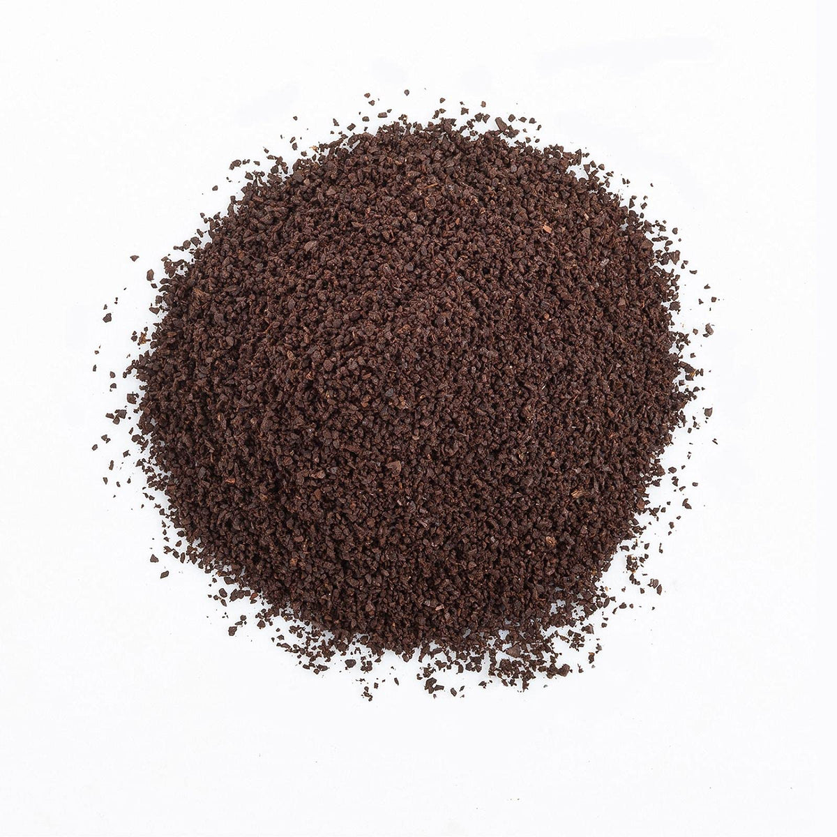The Organic Coffee Co. Arabica beans under warm light conveying premium freshness.