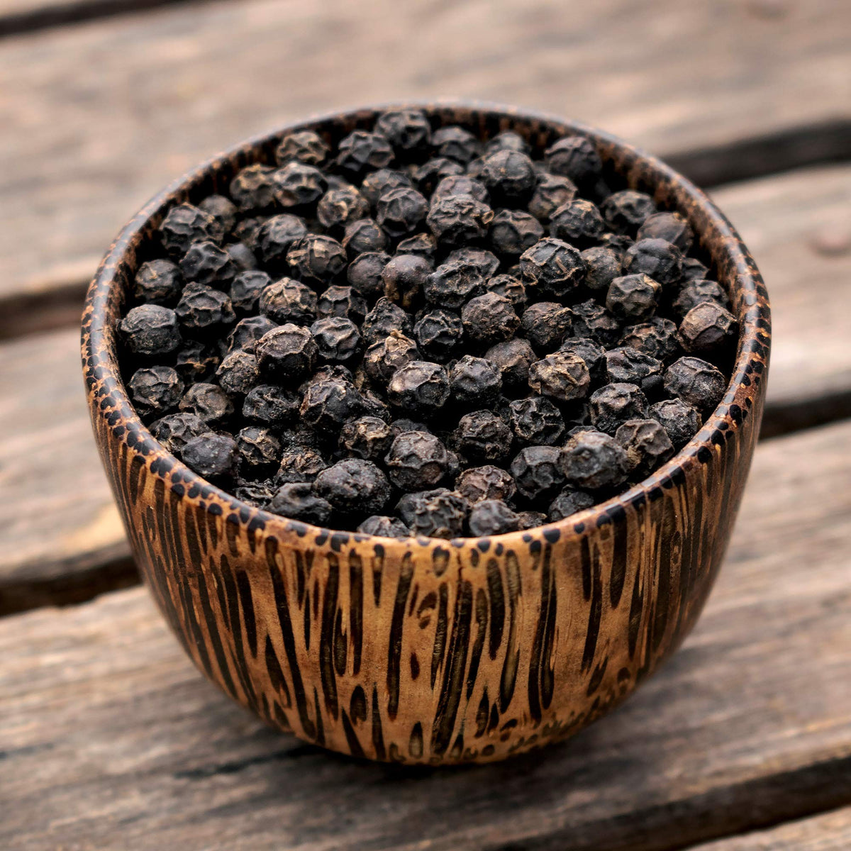 The Organic Pantry black peppercorns in a 1lb bag ready for grinder refills.