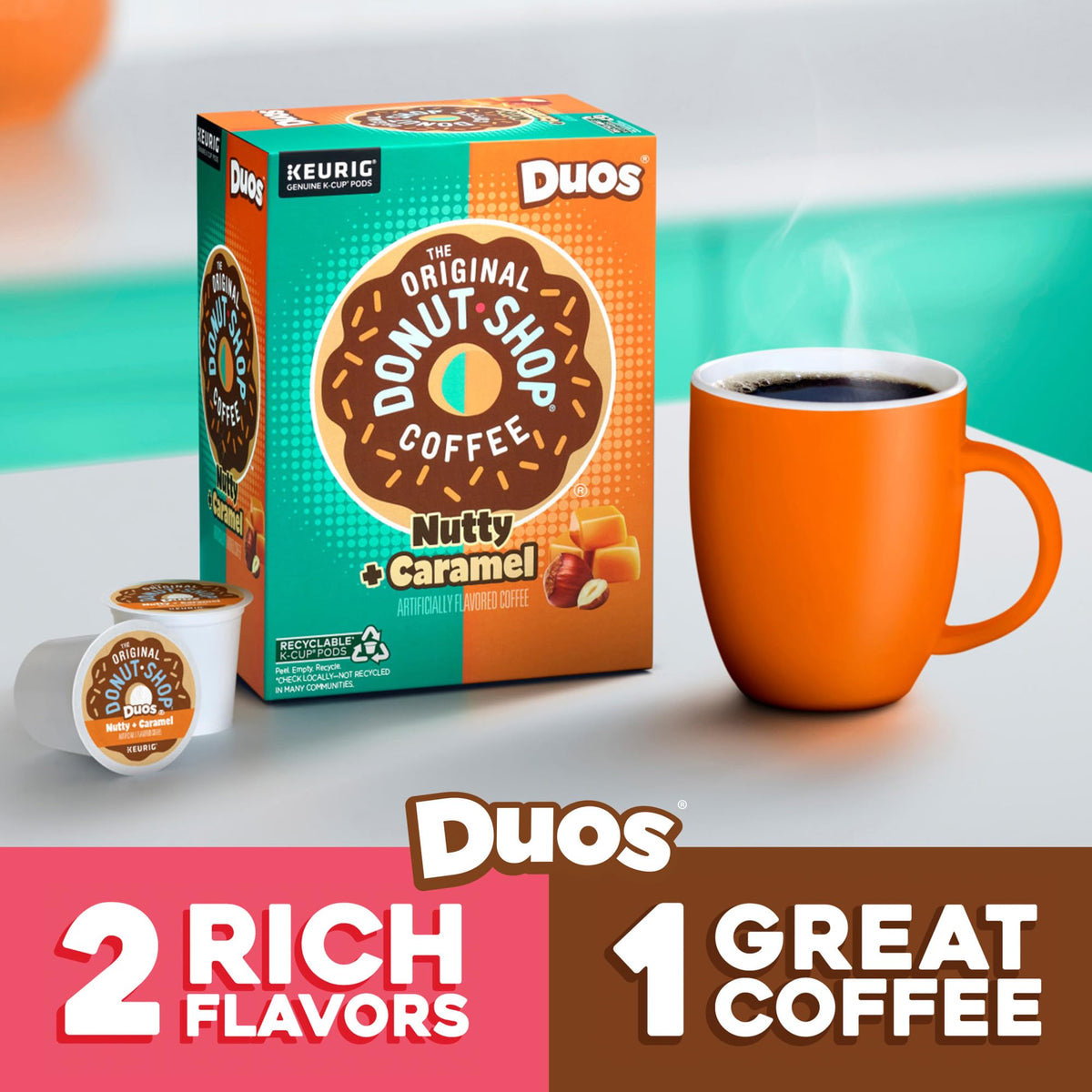The Original Donut Shop Duos Nutty and Caramel coffee in a steaming cup, perfect for breakfast.
