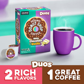 Steaming cup of The Original Donut Shop Duos white chocolate and vanilla flavor