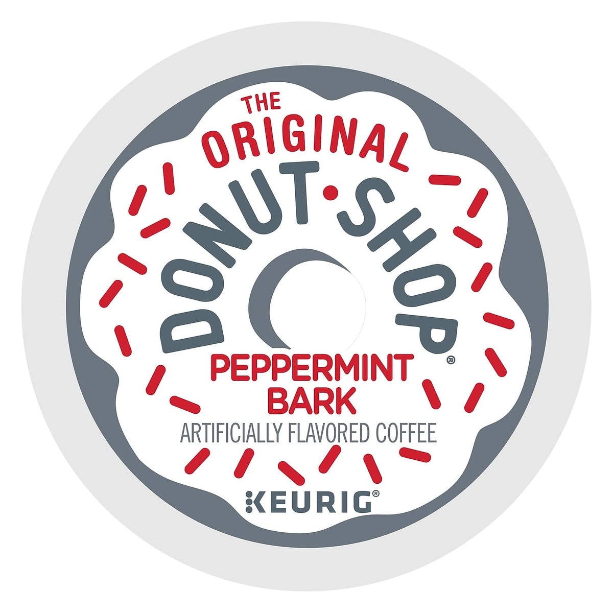 The Original Donut Shop Peppermint Bark K-Cup pod, top view, emphasizes compact, mess-free packaging.