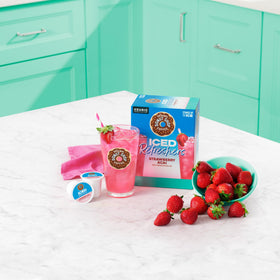 The Original Donut Shop Strawberry Acai Iced Refreshers cup over ice with extra chill.