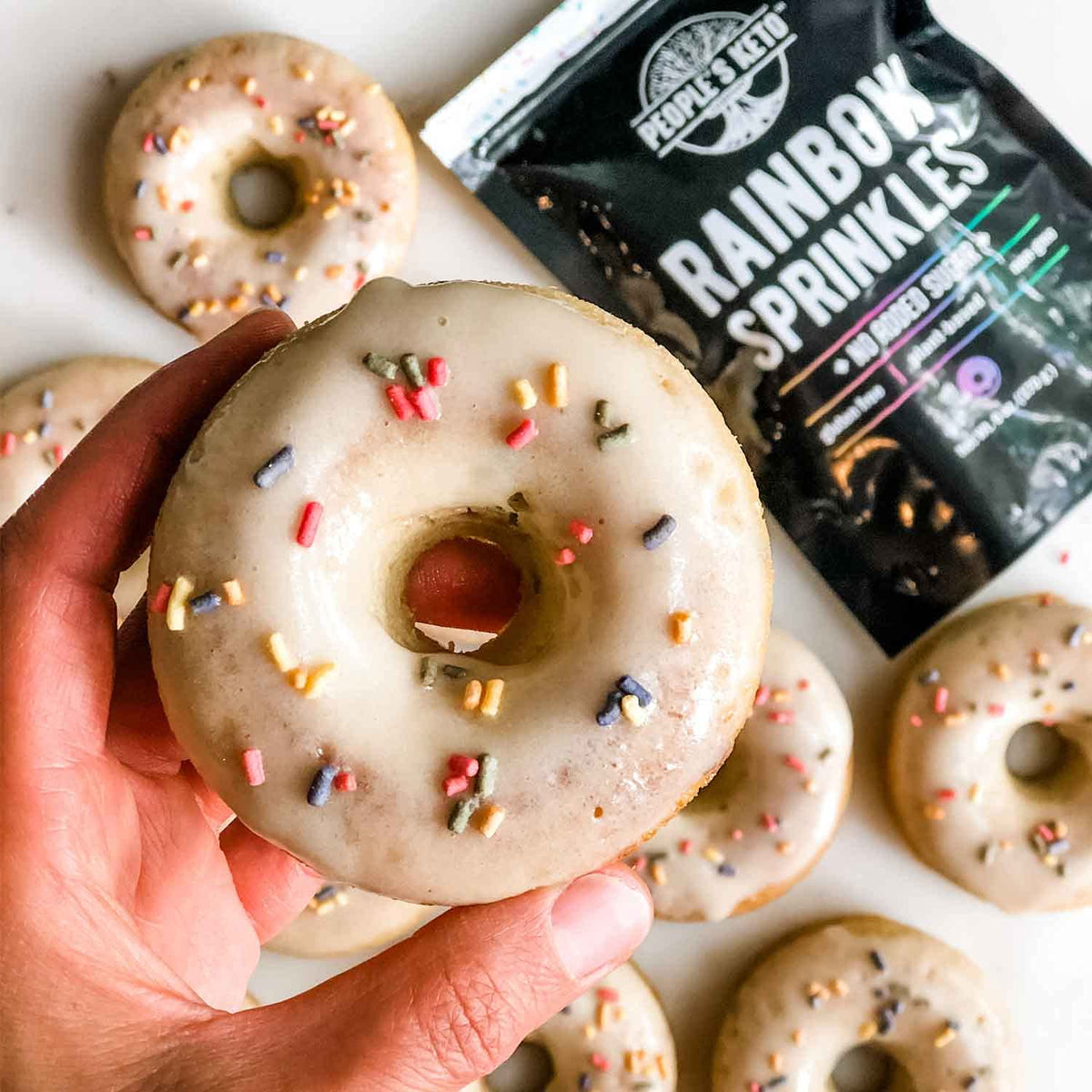 The People's Keto Company chocolate sprinkles close-up; zero added sugar, plant-based flavor.