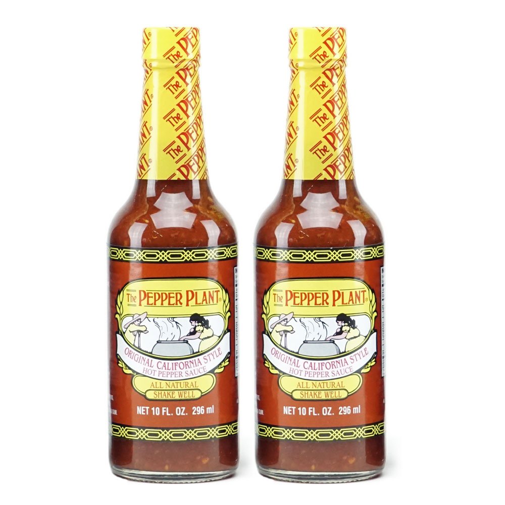 The Pepper Plant Original California Style Hot Pepper Sauce bottle pour, elevating soups, pizzas, and eggs.