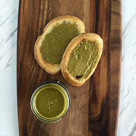 The Pistachio Factory pistachio butter drizzled on pancakes illustrates versatility.