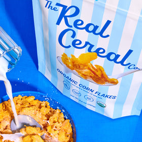 The Real Cereal Company organic corn flakes recyclable pouch, planet-friendly option