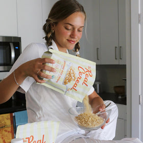 The Real Cereal Company serving idea with toppings and fruit.