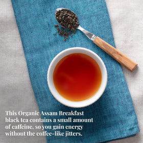 The Republic of Tea Assam Breakfast cup with milk, energizing ritual.