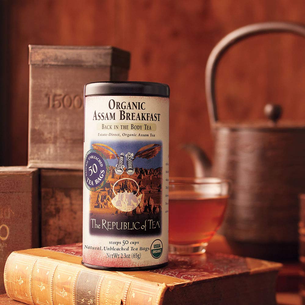 The Republic of Tea Assam Breakfast tea bags steeping in a cup for a bold, malty aroma.