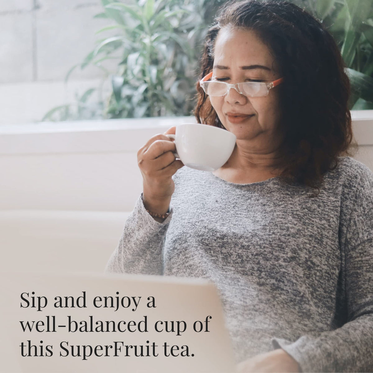 The Republic of Tea Blueberry Green Superfruit Tea dry leaf closeup showing antioxidant-rich berries.